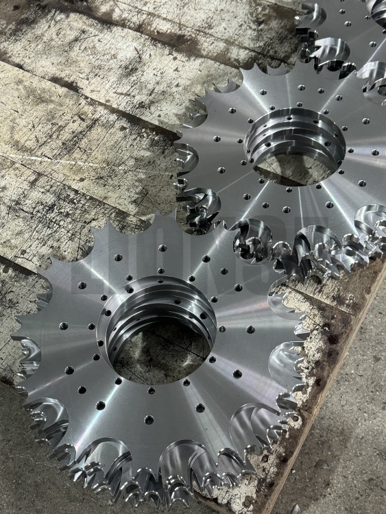 यांत्रिक उपकरणों में स्प्रोकेट का मुख्य कार्य क्या है?